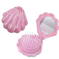 Portable Folding Shell Comb and compact mirror.