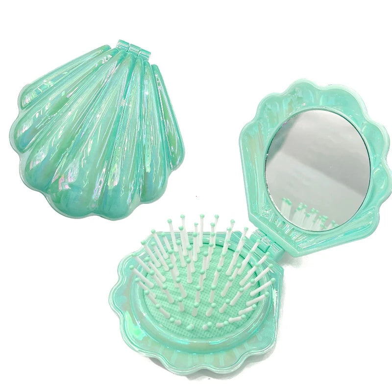 Portable Folding Shell Comb and compact mirror.
