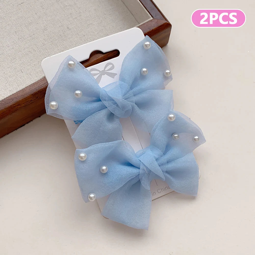 2 Pieces of Cute Multi-Coloured Bow Hair Clips for Girls with Faux Pearls, Suitable for Dressing up and Everyday Wear pretty party’s
