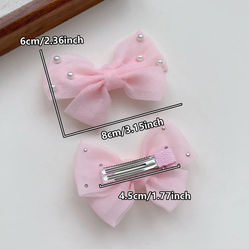 2 Pieces of Cute Multi-Coloured Bow Hair Clips for Girls with Faux Pearls, Suitable for Dressing up and Everyday Wear pretty party’s